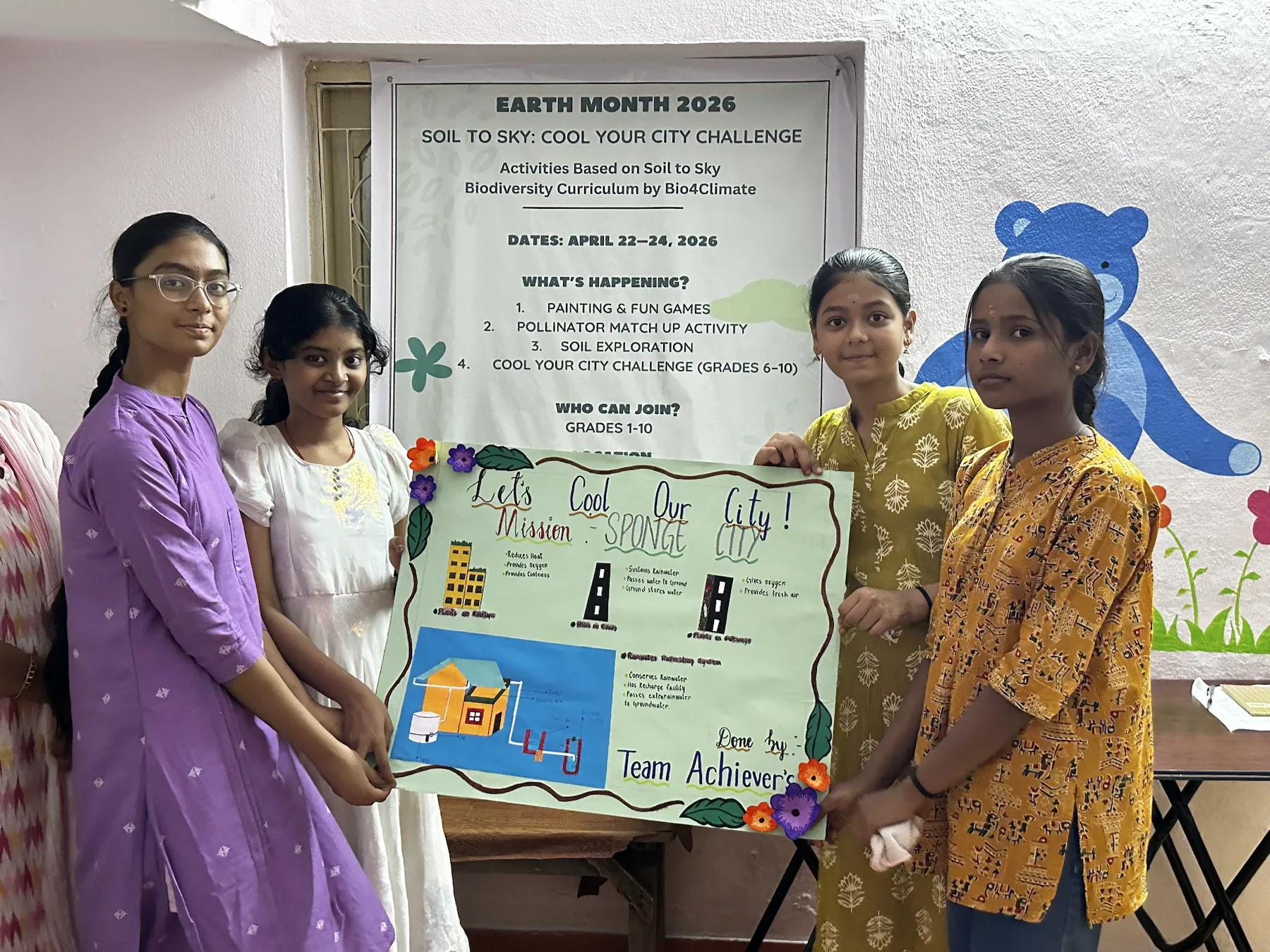 Team Achievers stands with the Mission Sponge City project model.
